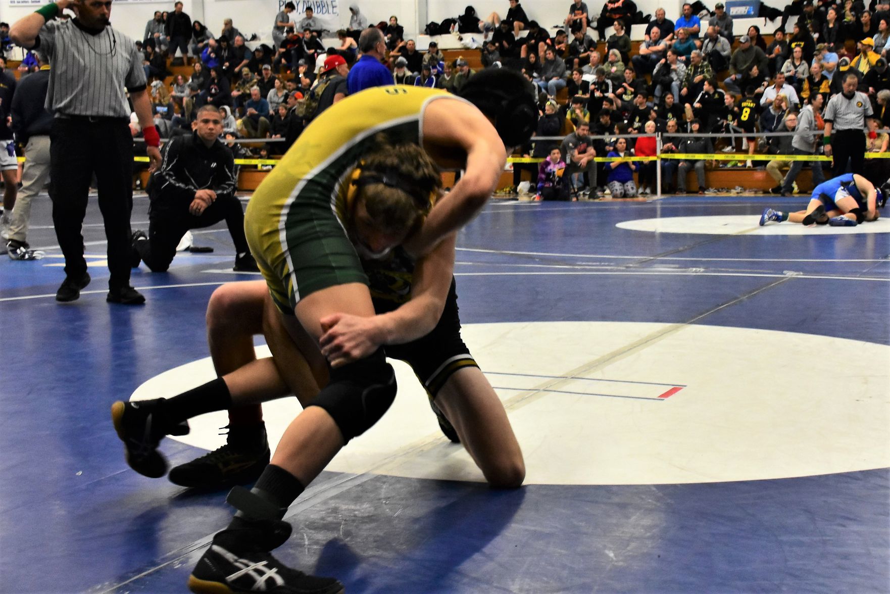 Cabrillo's Ryley Daltorio (Bottom) goes for a takedown on Santa Barbara's Gabriel Jimenez